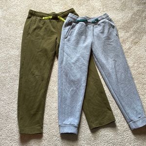 Two pair of Tek Gear ultra,soft fleece pants, size medium husky